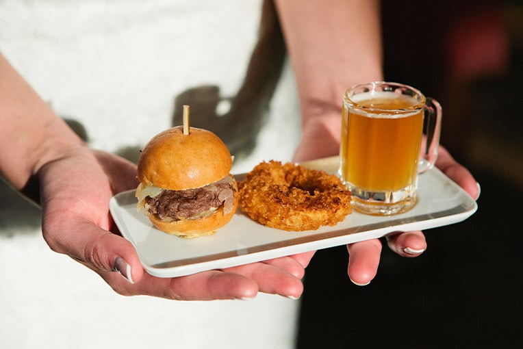 Burger, onion ring, and small beer | Lisa Dupar Catering | Wedding & Event Catering in Seattle