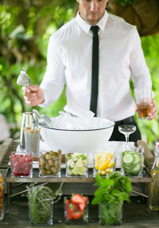 Bar tender in garden | Lisa Dupar Catering | Wedding & Event Catering in Seattle
